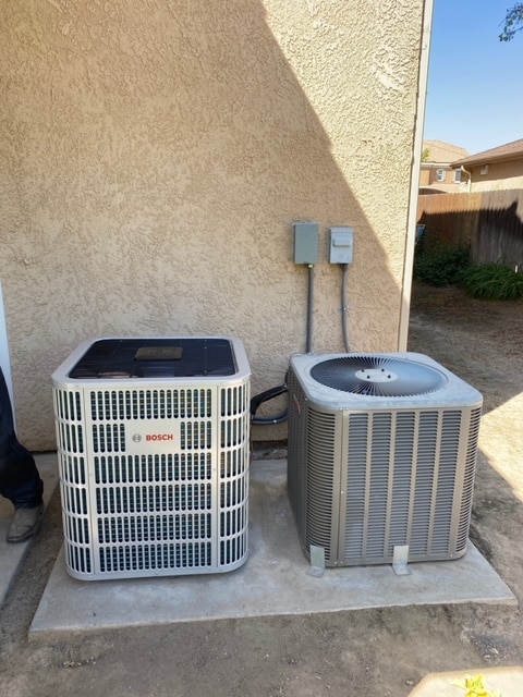 Picture of a condenser, this is the outside unit of a split system installed by Central Elite in Fresno, CA