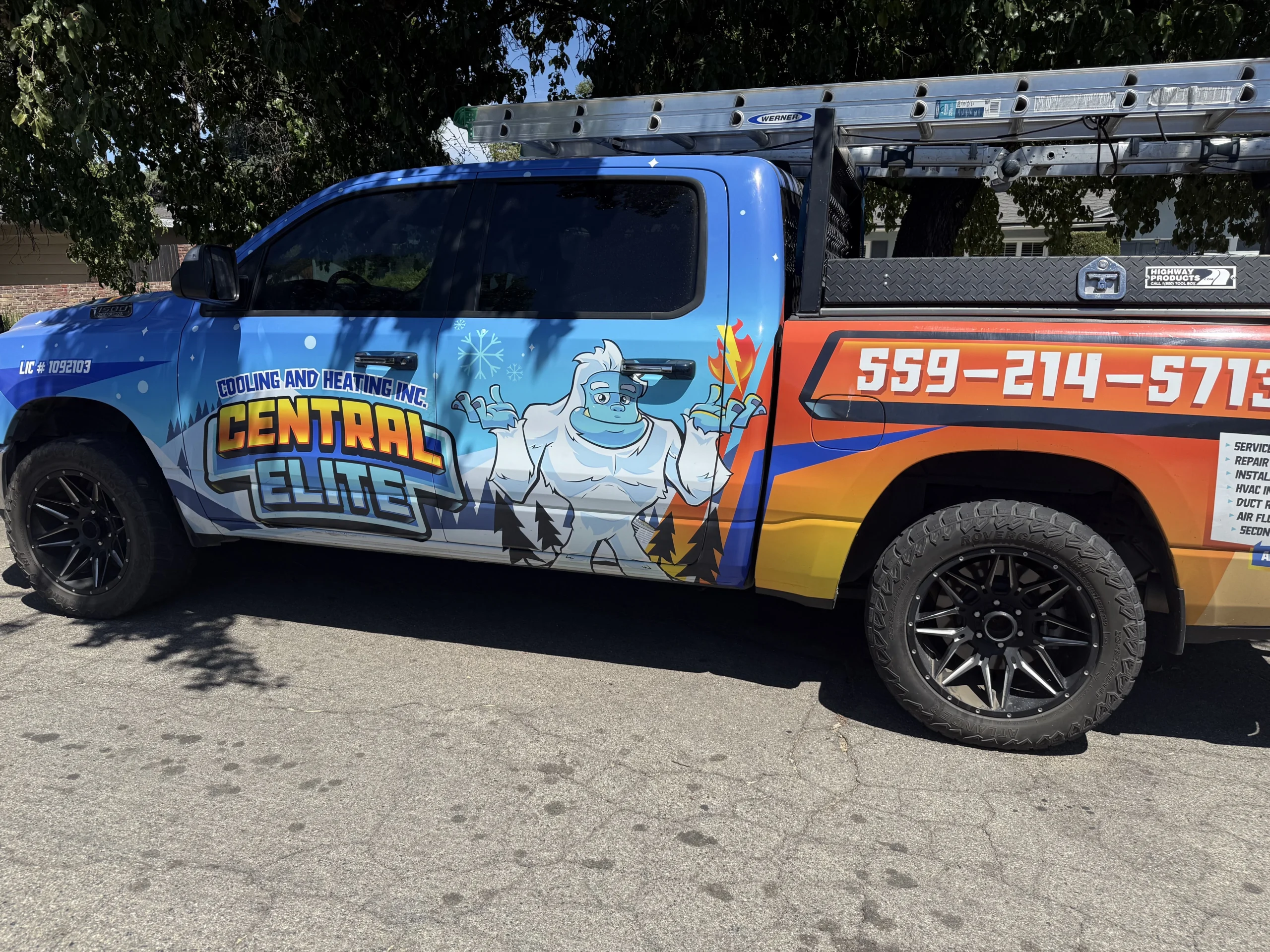 Central Elite HVAC technician servicing a system in Tulare California