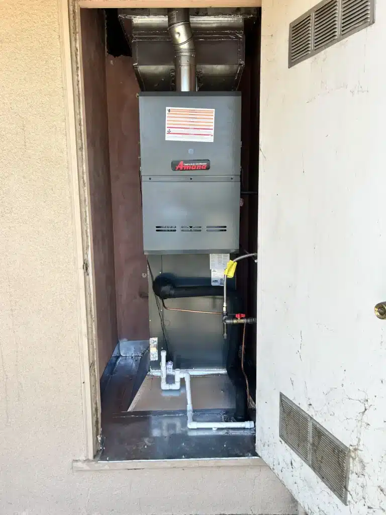 A residential gas furnace installed in a Fresno home, ready for seasonal maintenance